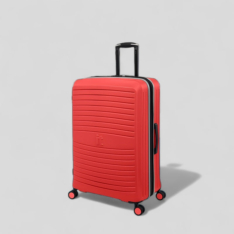 Bright red eco-friendly luggage set with durable wheels and a stylish design from Haris Luggage