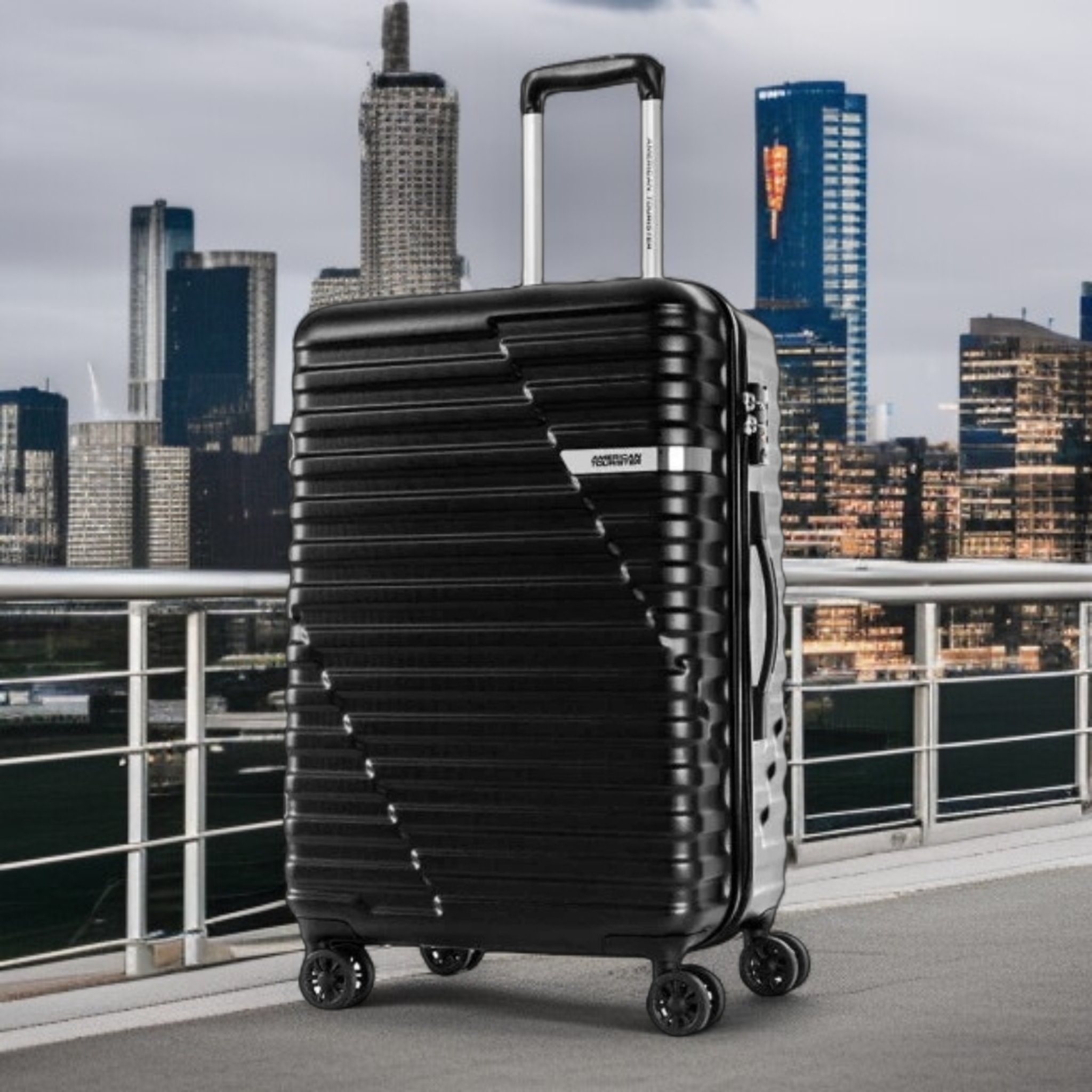 American Tourister Sky Bridge | TSA APPROVED - Haris Luggage