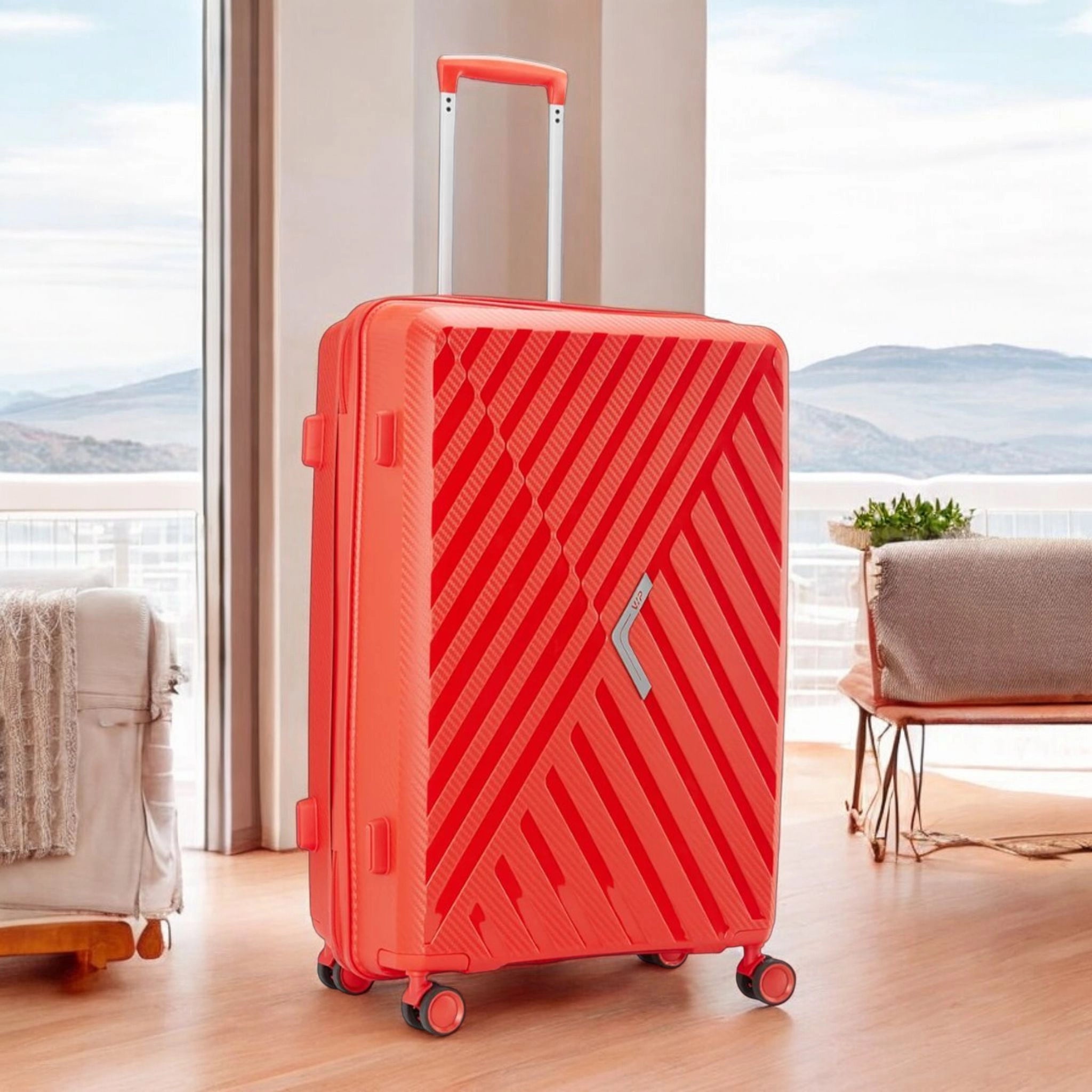 VIP Xlite PP luggage Pakistan in vibrant orange with a stylish design and smooth-rolling wheels