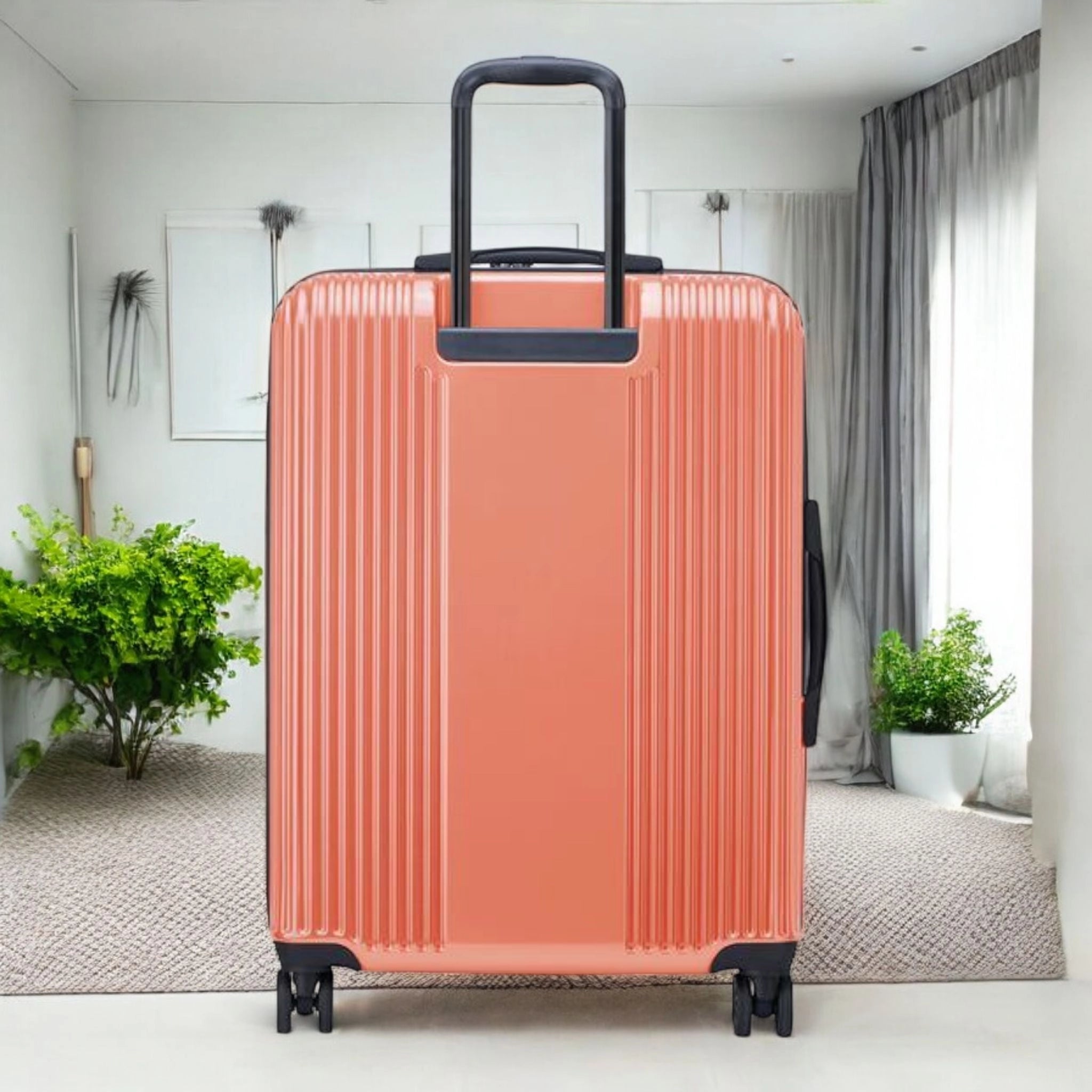 Delsey Ophelia luggage bag in coral color with a durable exterior and smooth-rolling wheels