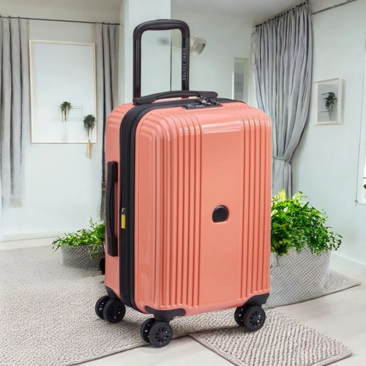 Delsey Ophelia luggage bag in coral color with four spinner wheels for easy travel